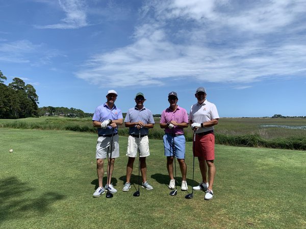 foursome in sea island habitat for humanity golf tournament.jpg