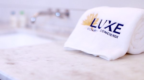 Luxe - Bath Towel Closeup - Rolled on Countertop.png
